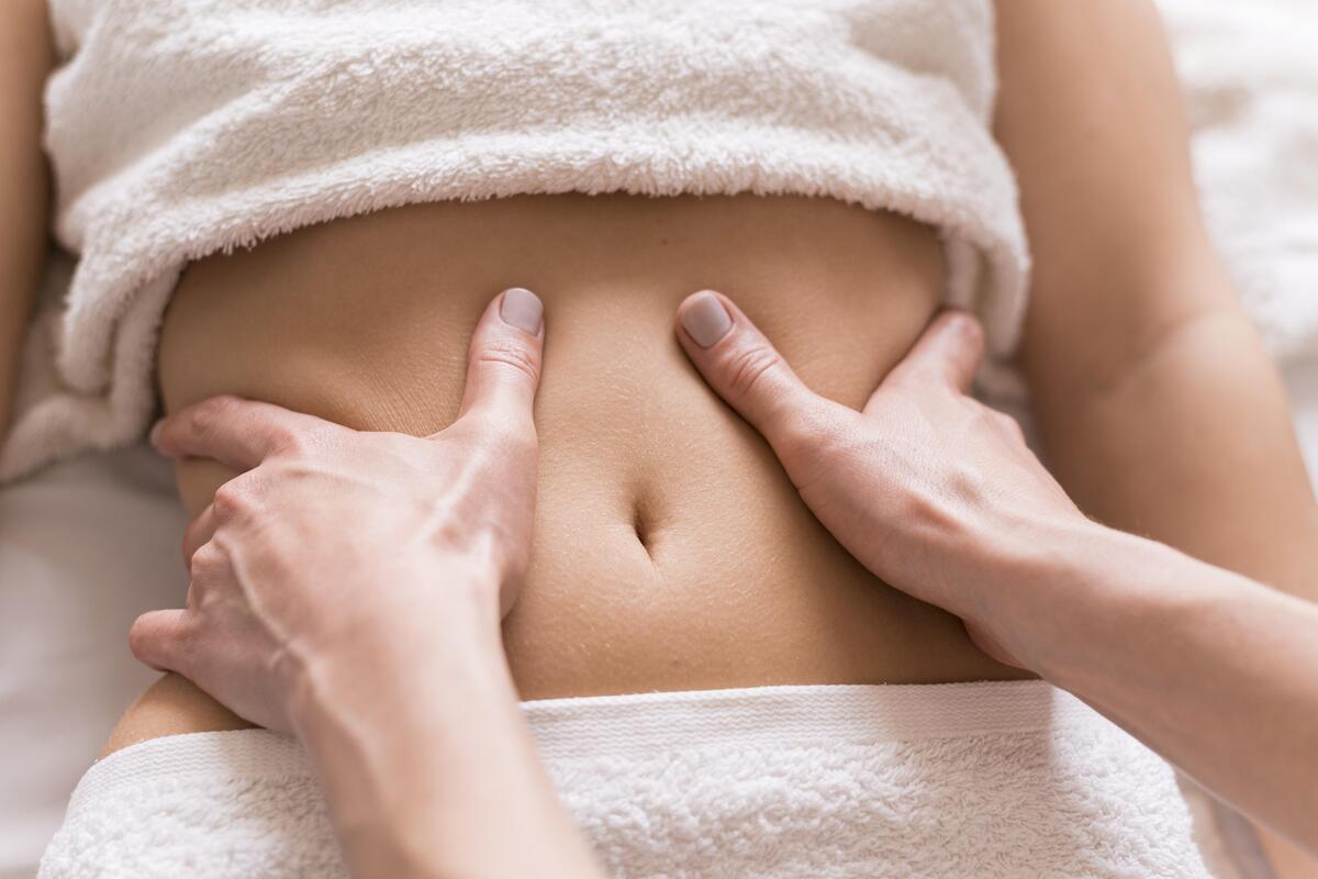 close-up-abdomen-massage-concept (1)
